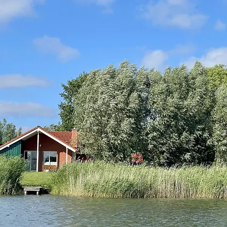4 Personen Mit Kanu, Kaminofen Und Herrlichem Seeblick In Otterndorf